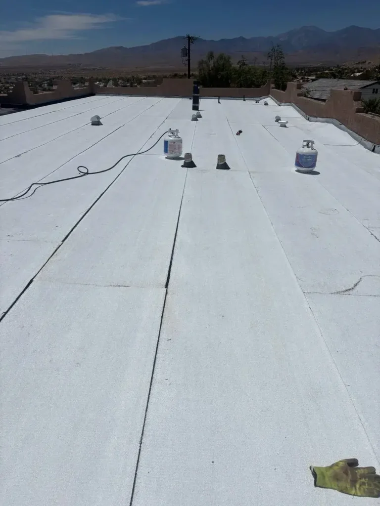 White reflective flat roof with vents