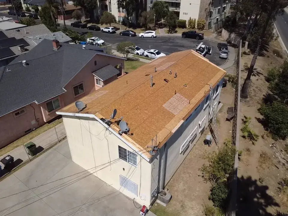 New plywood roof deck on a home during a roof replacement
