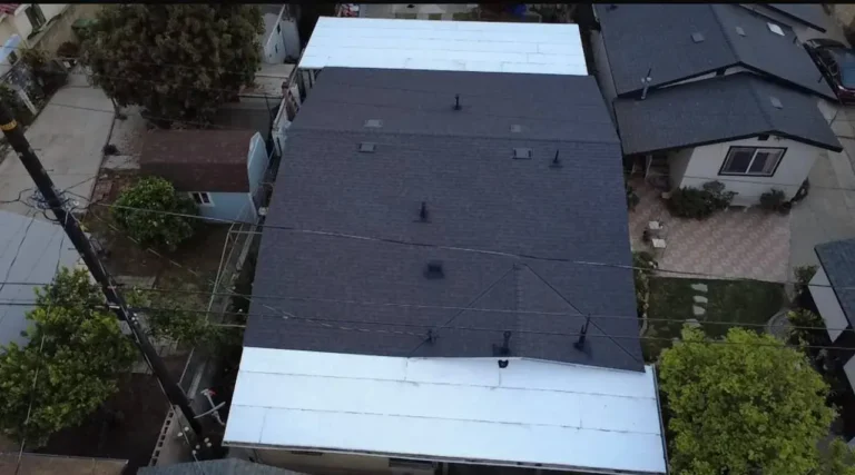 Aerial view of flat roofs with black and white membranes